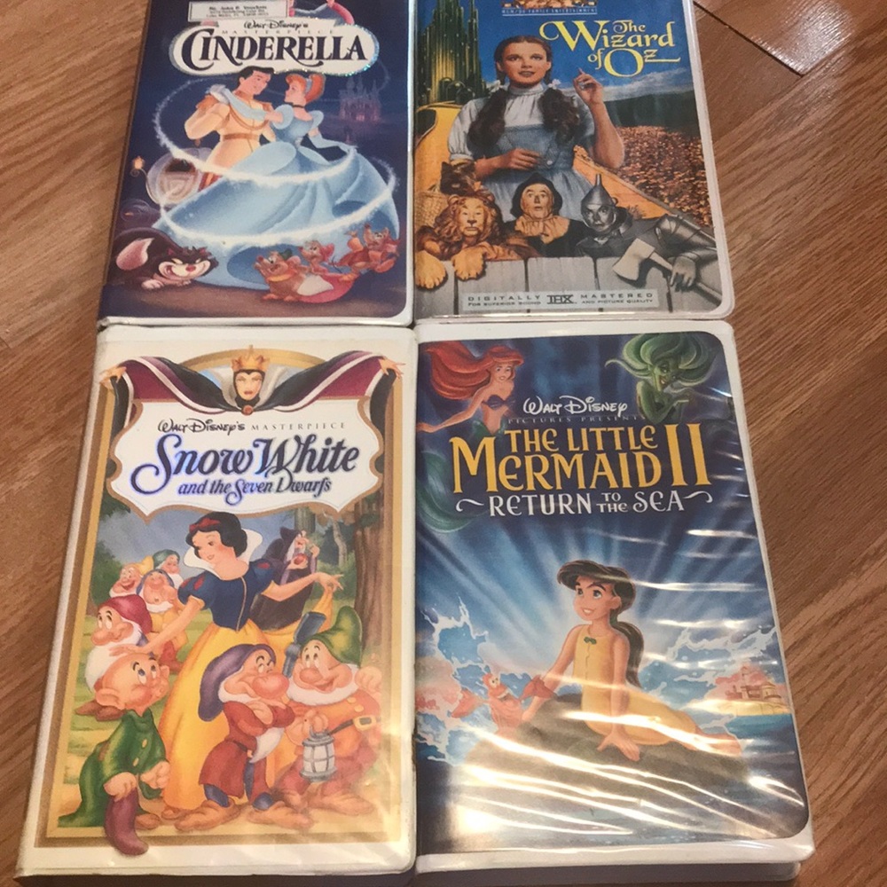 4 Disney VHS Tapes.